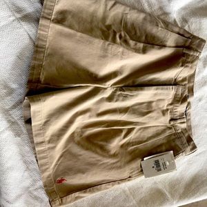 Khaki polo shorts.